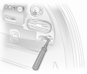 Variante 1 : les outils du véhicule se trouvent dans le compartiment droit du